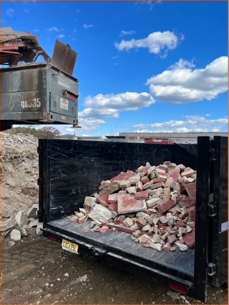 Driveway broken out and hauled away